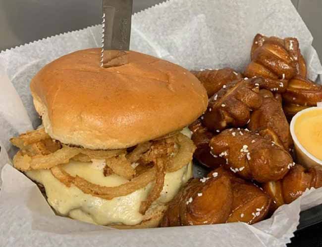 Sandwich and pretzels with cheese dipping sauce at Mastricola's On Broadway Berlin, WI restaurant, bar, grill and venue banquet hall